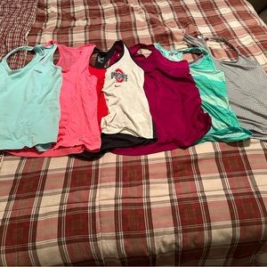 Lot of 6 running tanks. Sold as a lot only. All sized large.